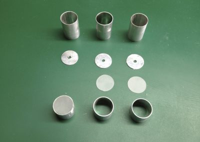 Here are the parts that make up the engine cans. End discs of .040 styrene, diffusers of .015 clear styrene fogged by sanding, and tubes of 5/8" thin-wall aluminum tubing.